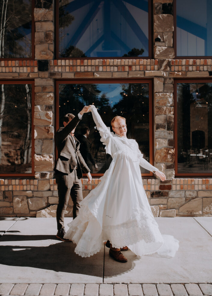 groom spins his best friend in prank wedding dress
